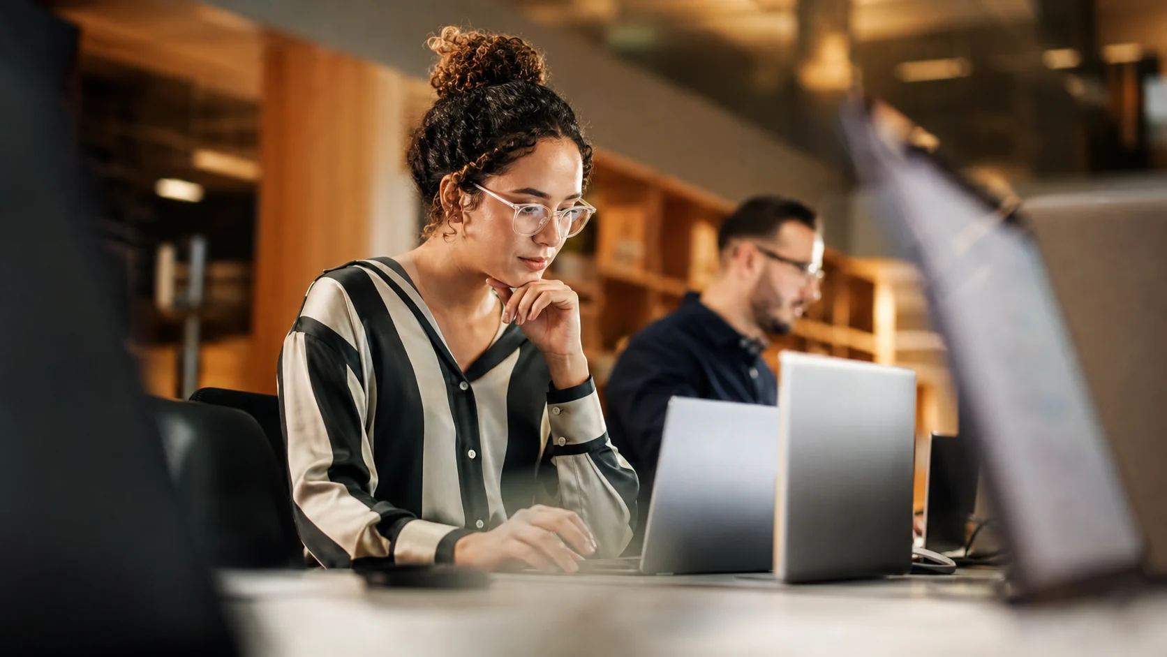 Colleagues working together in a shared office